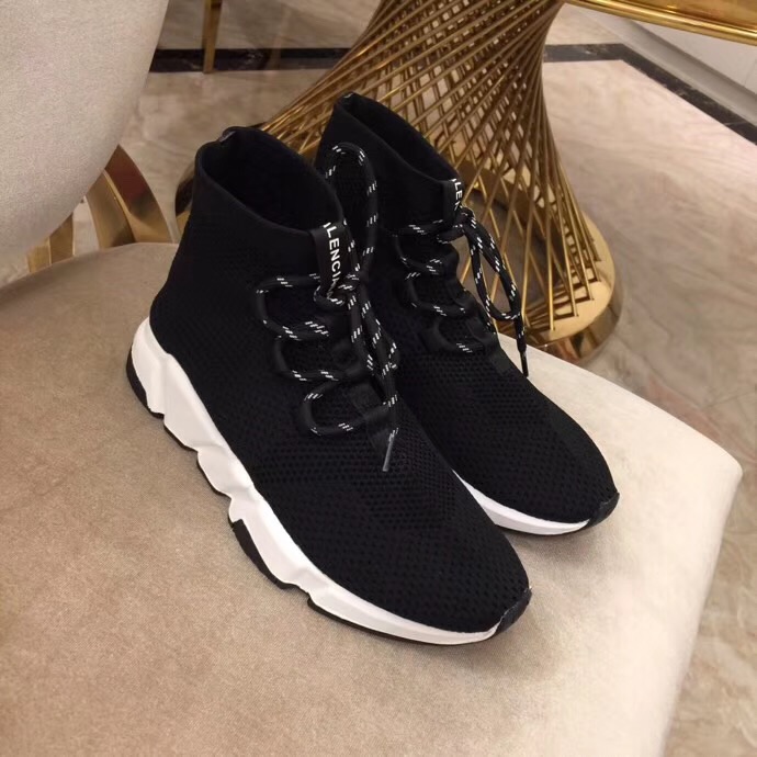 socked football boots