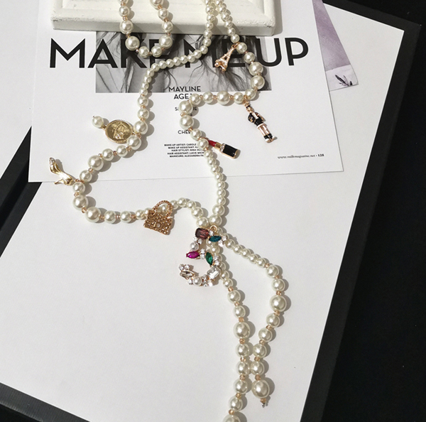 

Long Simulated Pearl Necklace For Women No.5 pendant Long necklace trendy design style pearl tassel