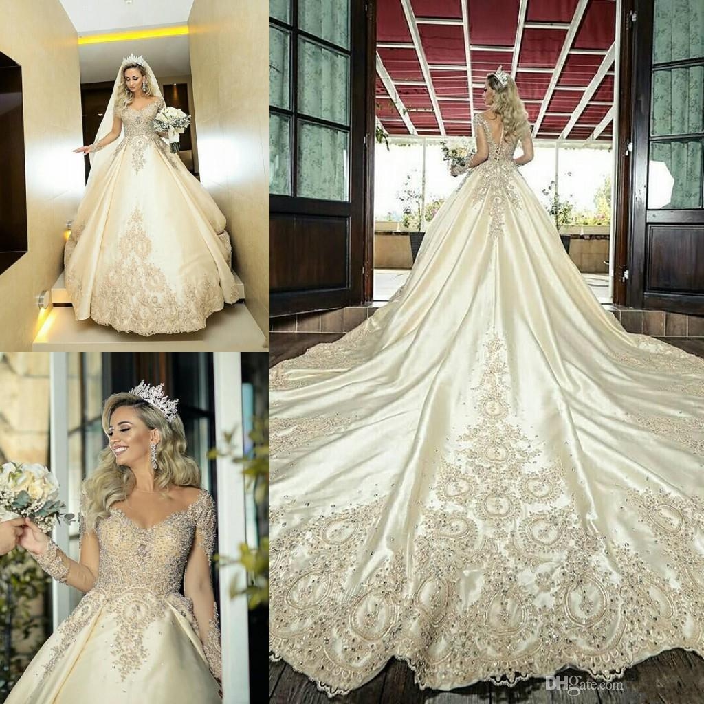 

2020 Luxury Sheer Long Sleeves A-Line Wedding Dresses Lace Applique Beaded Bridal Gowns Formal Long Garden Robe De Marriage Plus Size BC2981, White