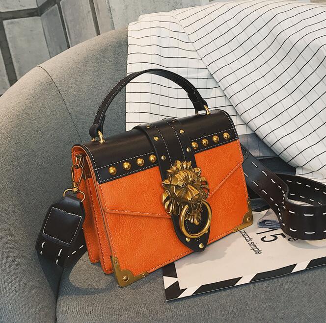 

Factory wholesale women bag street trend rivets womens shoulder bags personality leading lock punk shoulders handbag flip leather rivet fashion handbags