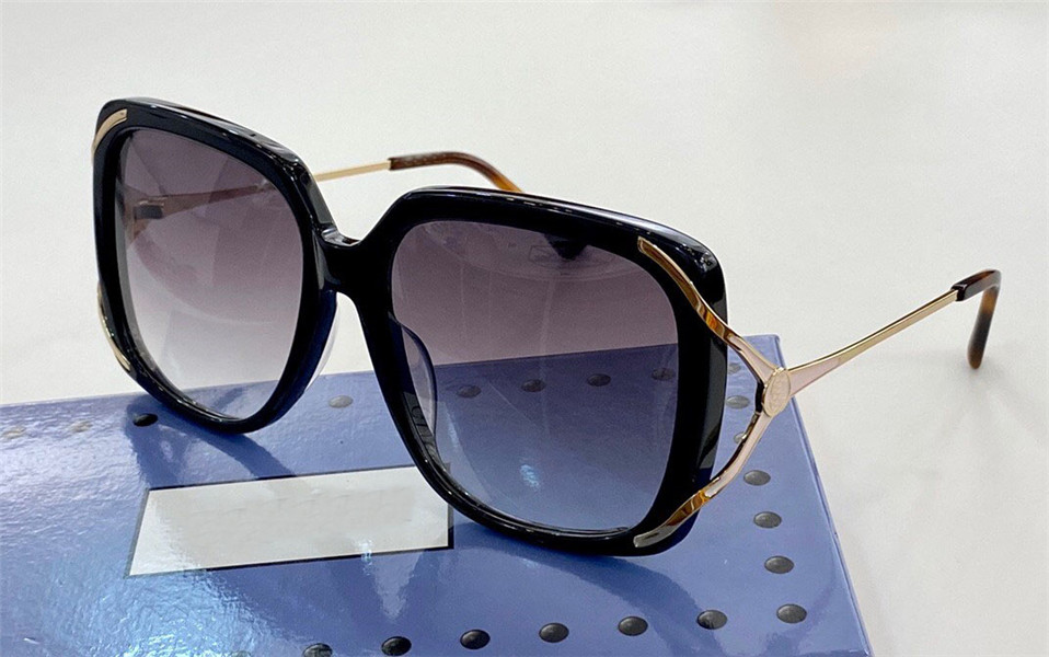 Le nouveau concepteur de lunettes de soleil mode 0443 métal cadre carré tempes creuses simples femmes de style populaire été en plein air lunette