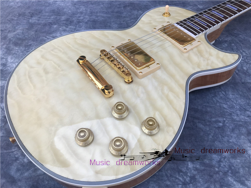 

China electric guitar The original wood color, quilted maple wood free shipping