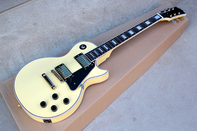 

Factory Custom Cream Electric Guitar With Gold Hardware,Block Fret Inlay,Black Pickguard,Can be customized
