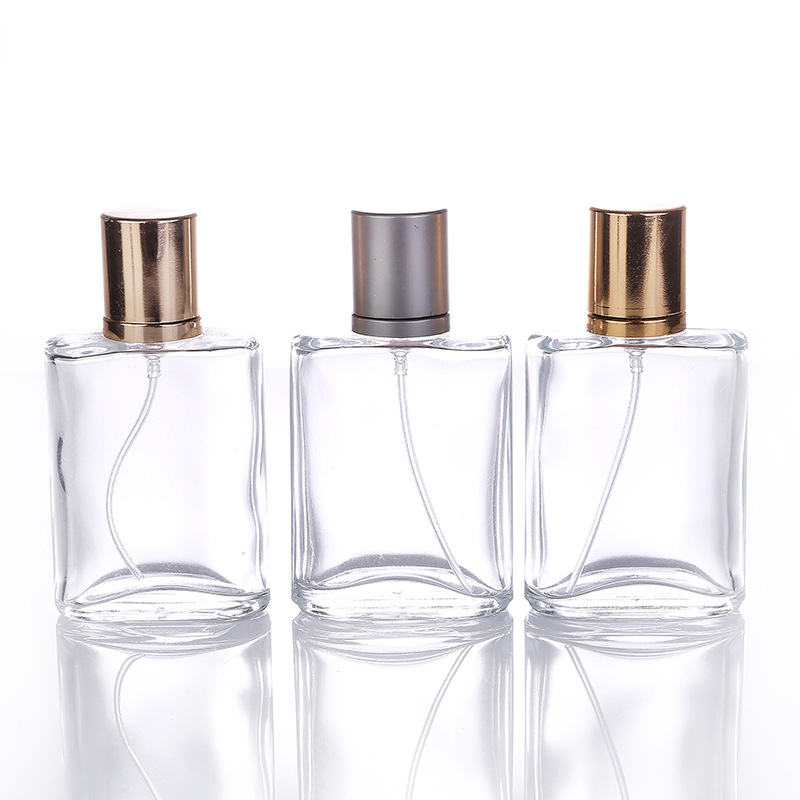 

Wholesale Price Empty Clear Perfume Bottles 30ml Gold Grey Pump Sprayer Lids Parfume Refillable Glass Spray Bottles 30 ml