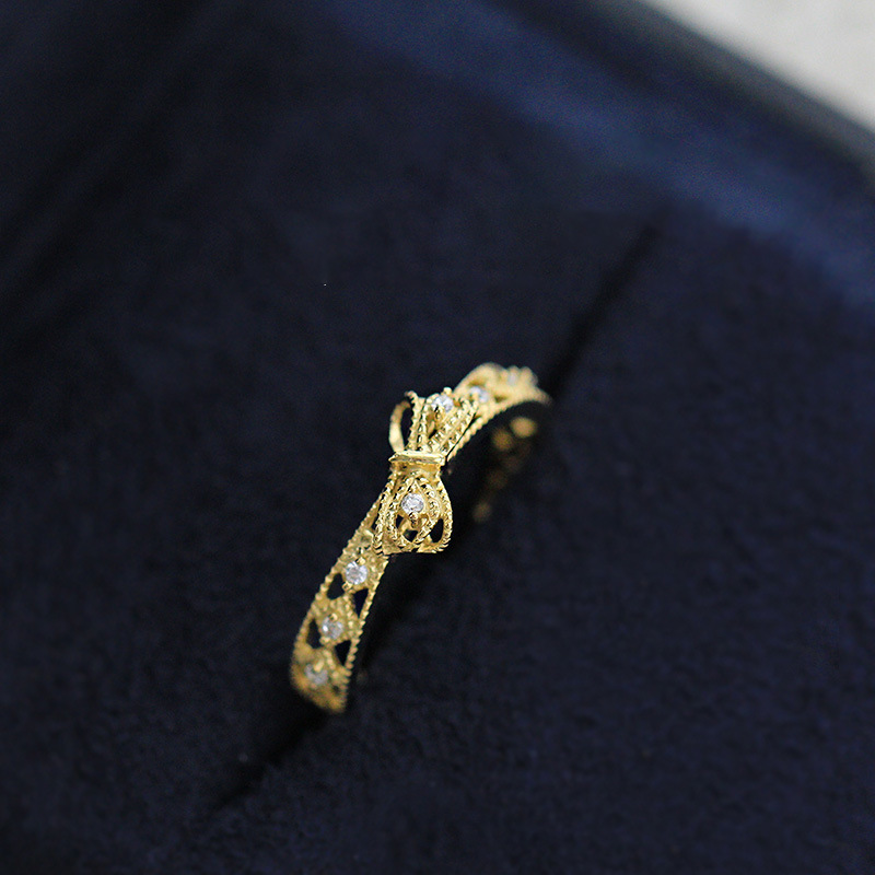 

Concise Micro Zircon Plating 14k Color Ring Ma'am Oblique Bow Ring Weijie