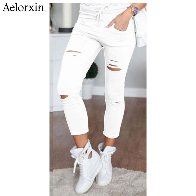 

2019 Blast oversized code hole high waist high elastic small foot pencil jeans casual cotton nine minutes ladies jeans, Black