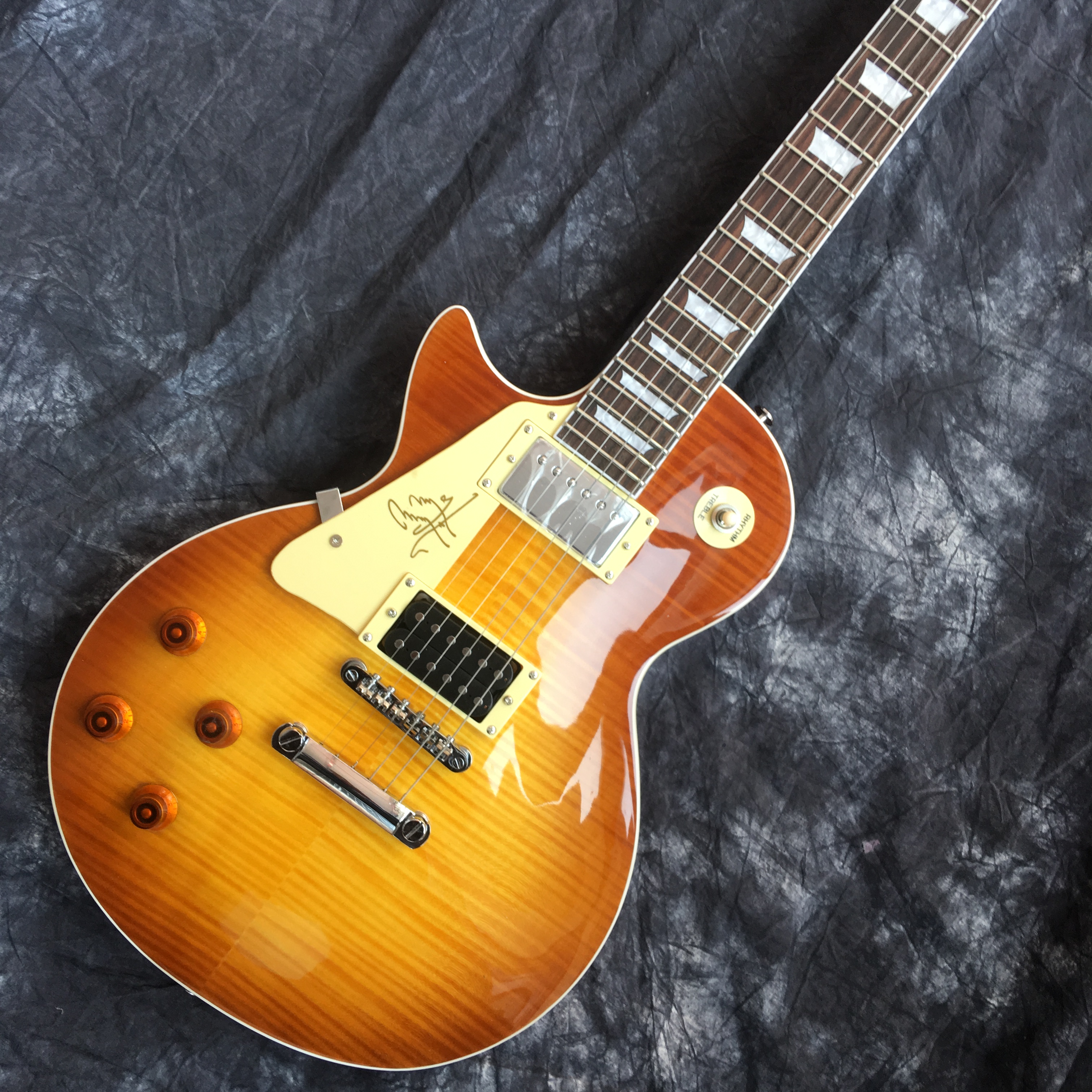 

Hot standard electric guitar, left hand lp guitar, high-quality striped tiger maple, mahogany. Good sound quality, free shipping