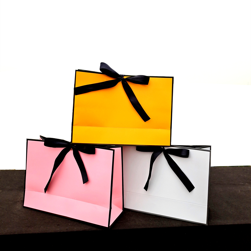 

New black frame gift bag clothing Book Pajama gift box packaging gold handle paper bag kraft paper with handle