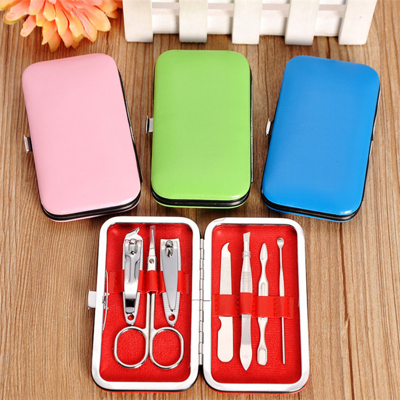 

7 pcs Nail Clippers Kit Scissors Tweezer Knife Ear pick Utility Manicure Set Tools Random Colors Epacket