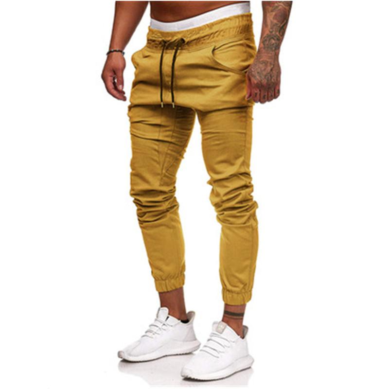 

Fashion Trend Casual Man Pants Hip Hop Tooling Pocket Tether Elastic Trousers Jogger Pants Designer Spring Male Sports Loose Pencil Clothes