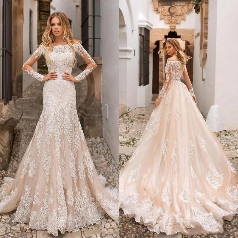 

2021 Mermaid Bridal Gowns Off Shoulder Button Back Lace Appliques Sheer Long Sleeves Tulle Wedding Dresses, White