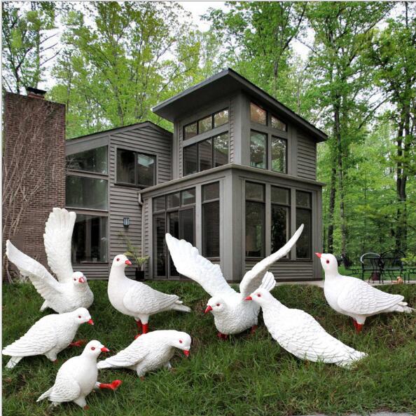 Simulation of dove ornaments, fake dove models, outdoor landscaping, animal sculptures, sketches, courtyard lawn decoration-image-493580144