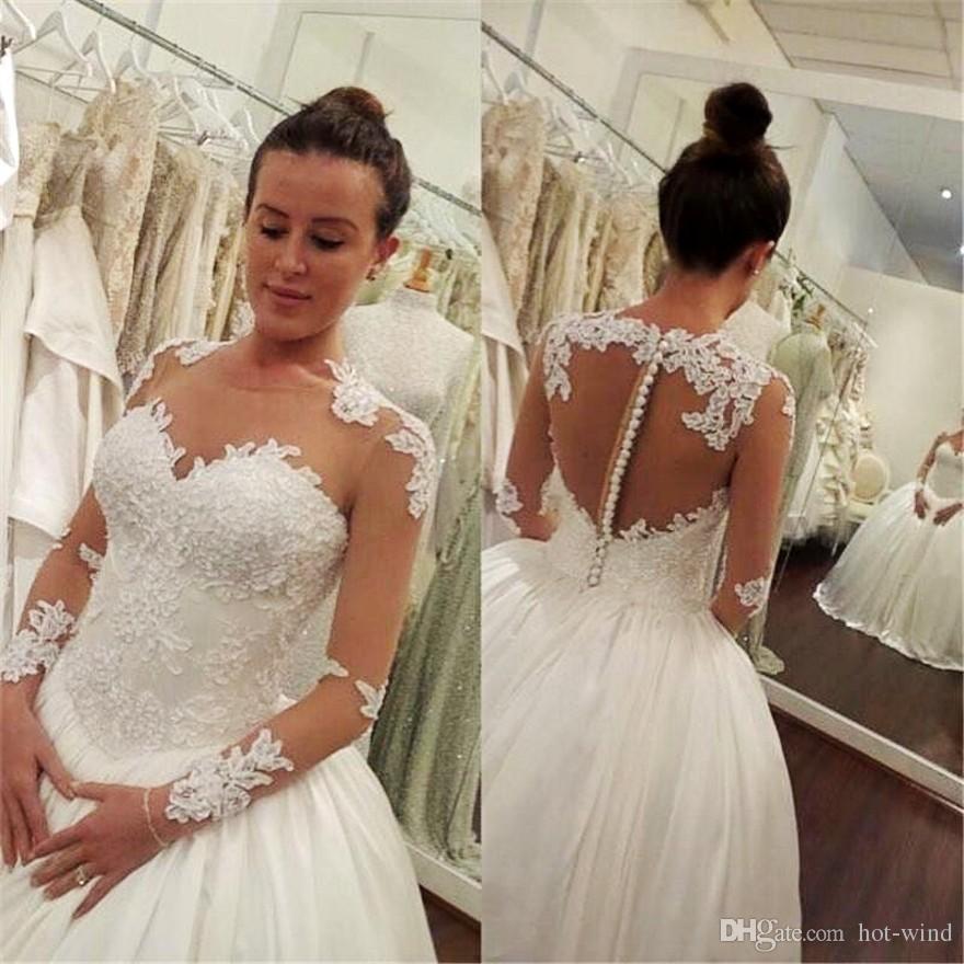 

2020 Lace Appliques Long Sleeves Ball Gown Wedding Dress Jewel Sheer Neck Illusion Back Covered Button Bridal Gowns, Dark navy