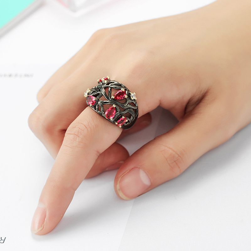 

Creative Black Gold Color Branch Female Rings Euramerica Hollow Red Water Drop Pear Shape Zircon Rings for Women Party Jewelry