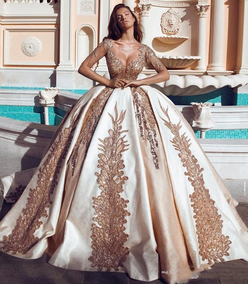 

2019 Luxury Dubai Wedding Dresses Gold Sequins Beaded Sheer Neck Bridal Gowns Champagne Satin Ball Gown Wedding Vestidos Custom Made