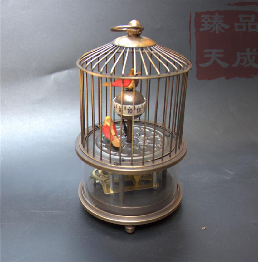 

Rare latón jaula de pájaro mecánico reloj de mesa reloj