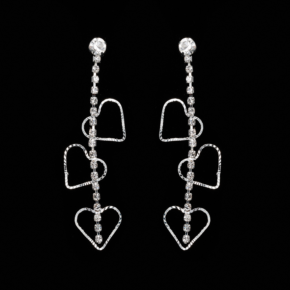 

Temperament Long Heart-shaped Pendant Earrings Personality Tassels Joker Eardrop