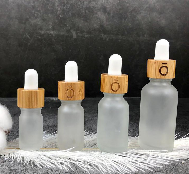

5 10 15ml 30ml 50ml Frosted clear Glass Dropper Bottles with Bamboo Cap 1oz Bamboos Essential Oil Bottle custom logo