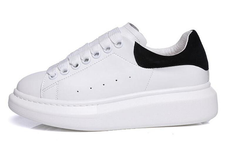 white thick soled tennis shoes
