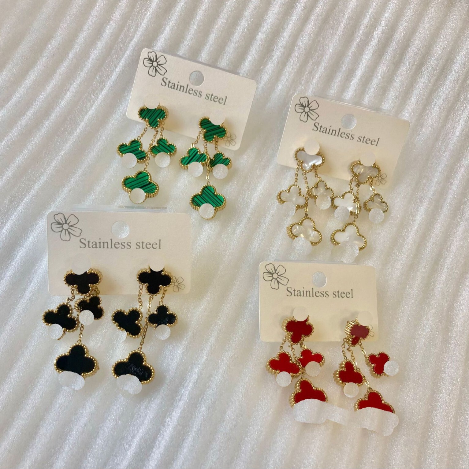 Light luxury fashion titanium double-sided earrings, high-end multi-flower four-leaf clover studs
