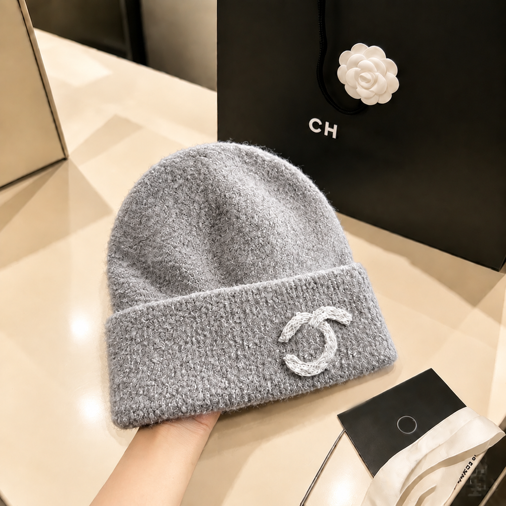 Designer et hiver luxe femmes hommes nouveau chaud tricoté protection de l'oreille tempérament décontracté casquette de ski casquettes de ski de