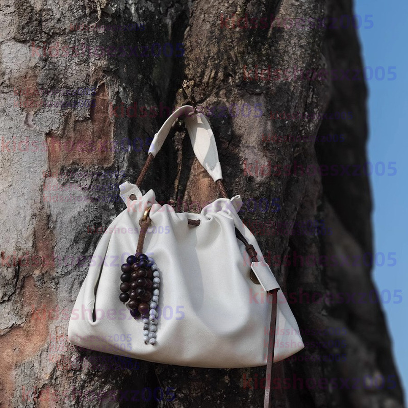 Songmontbag Cross Body Designer Bags Songmount Song Bag Small Shoulder Bags For Women Luxury With Ear Loops Women Top Layer Cowhide Kids Commuter Ha