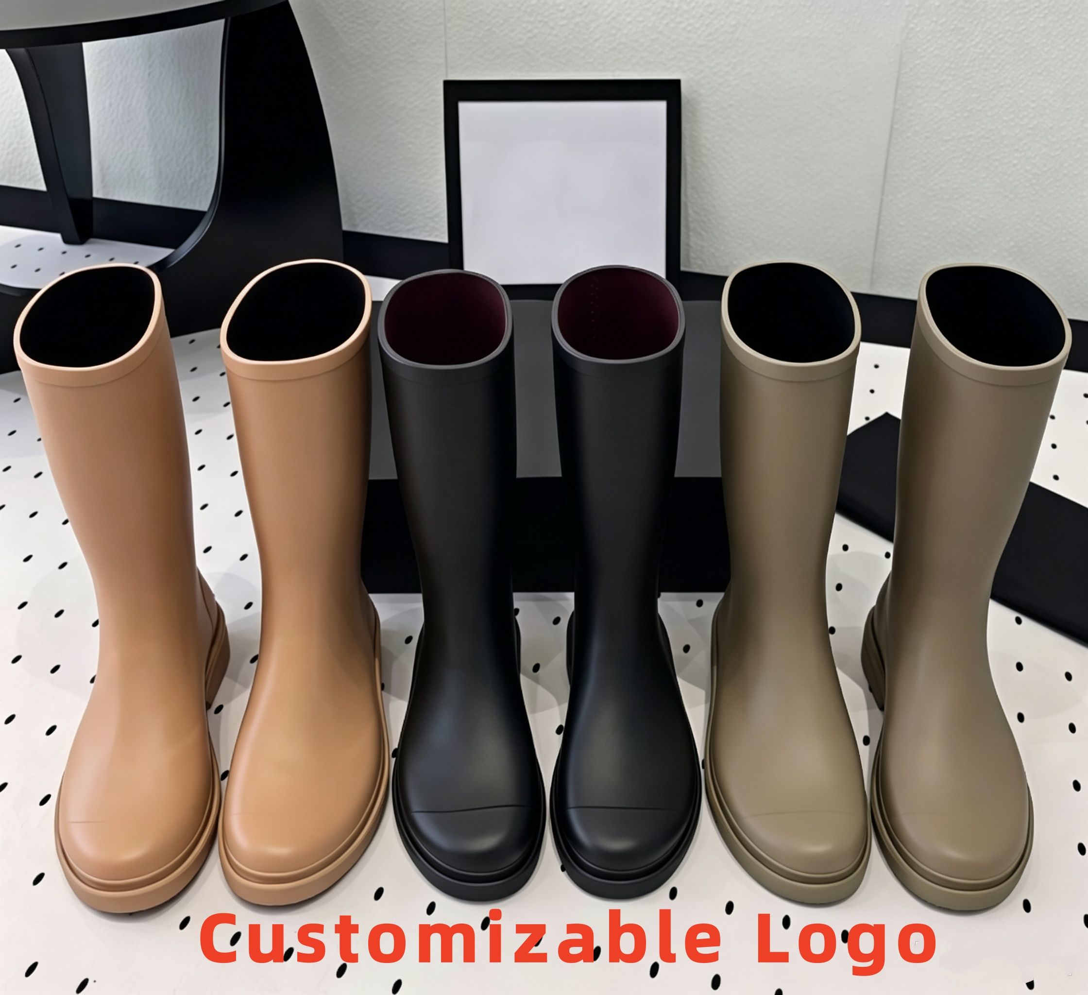 Top luxury designer women's knight mid length waterproof and anti slip rain boots with customizable logos, fashionable black rubber knee hig