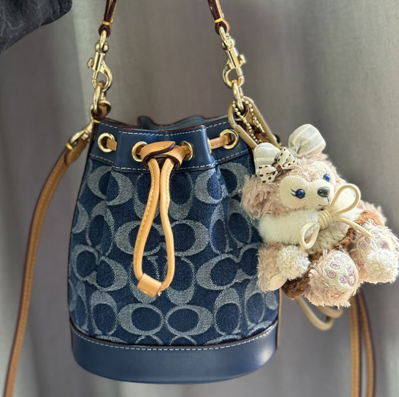 designer bags 2026 trends cachy new vintage drawstring small bucket luxury single shoulder fashion versatile women's bag with pendant decoratio