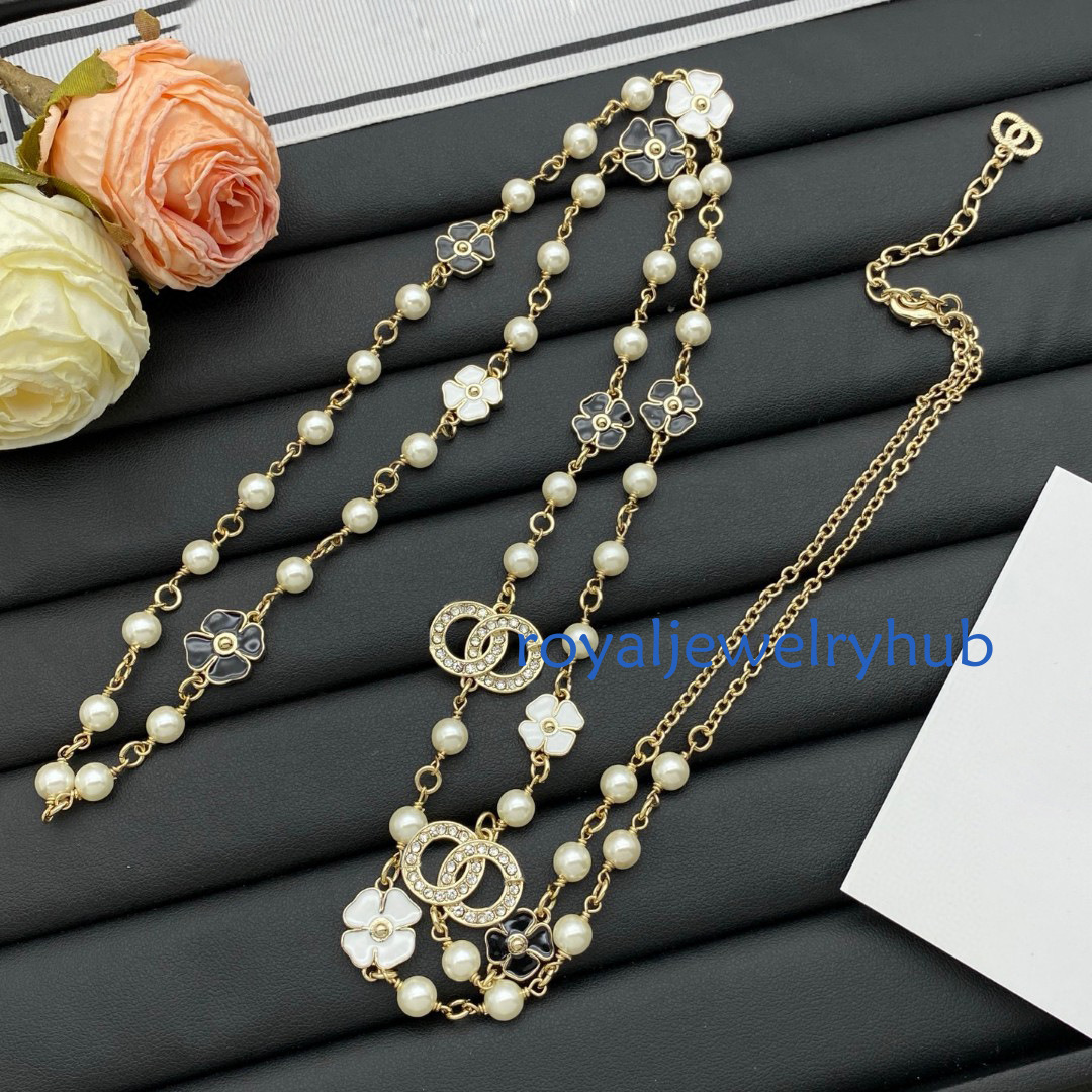 Designer Jewelry Channel necklaces pearl four leaf clover sweater chain for women featuring camellia flower design in a light style and long length