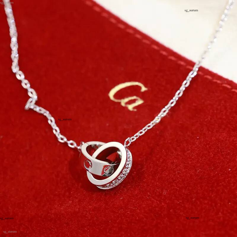 2026 Collier collier de luxe designer bicyclo bijoux femmes diamants amour chaîne en métal mince lettre pendentif colliers de charmeMeilleures ve