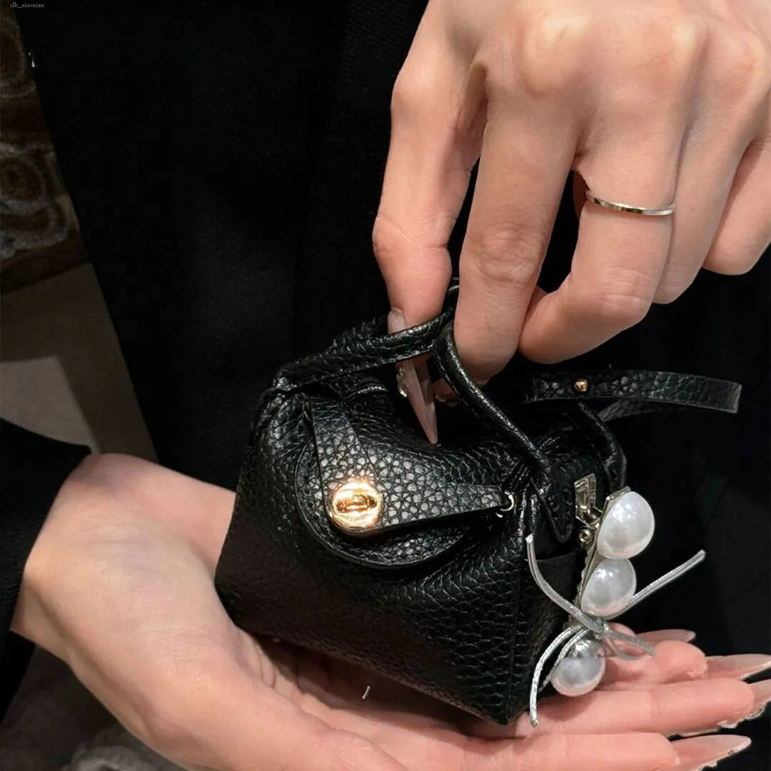 Porte-clés en cuir de styliste pour femmes, multicolore, épaule croisée, serrure rotative, petit argent, rangement de rouge à lèvres, Mini sac à