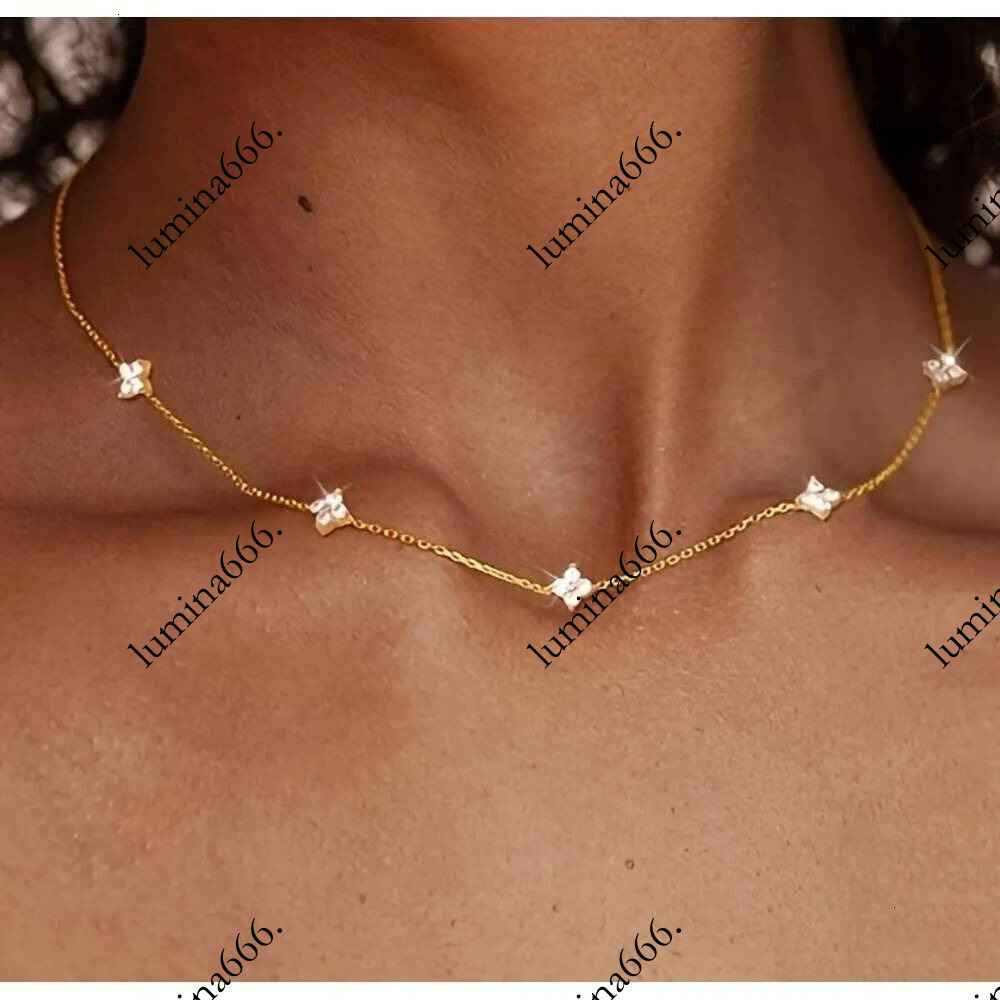 Four Leaf Clover Necklace Designer For Women Adorned with Tiny Sparkling Gems Elegant Stardust Design