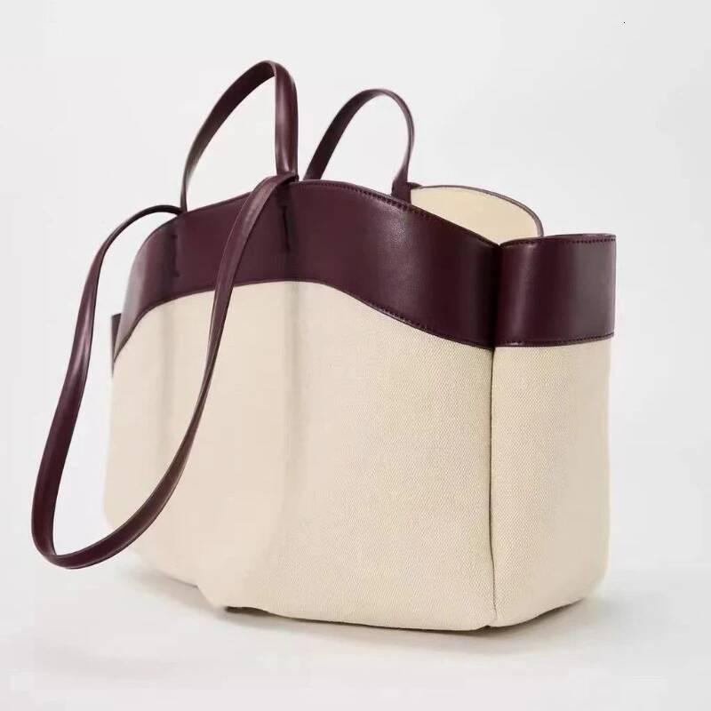 Foreign Trade Fashion Beautiful Canvas Satchels New Mommy Bag Large Capacity Commuter Hand Bill Shoulder Casual Tote Package