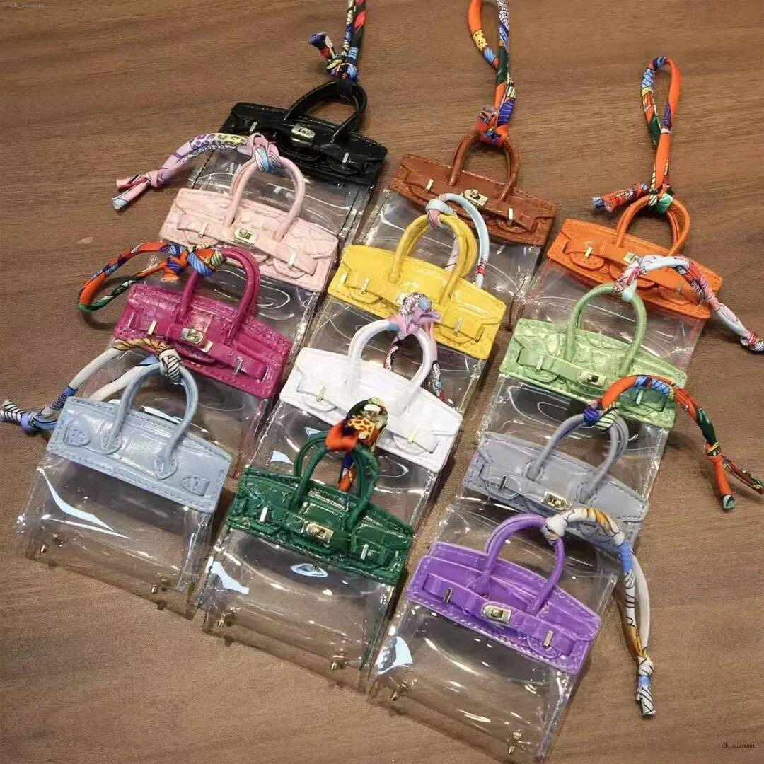 Designer Men's and Women's Transparent Keychain Charm Lipstick Earphones Foreskin Leather Mini Pendant Coin Wallet Platinum Bag Hanging