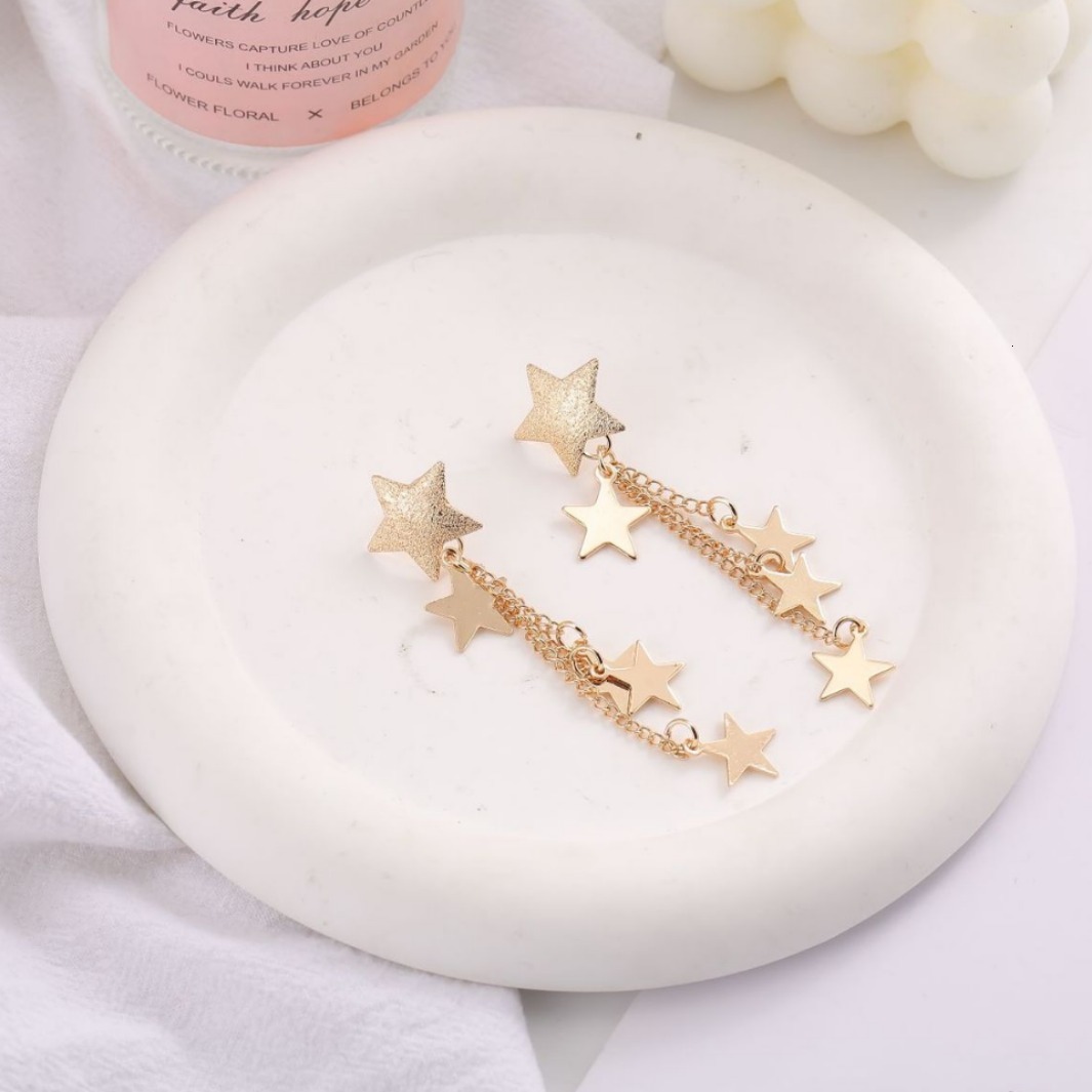 Korean-style hollow five-pointed star with tassels, long elegant star-shaped earrings for women, wholesale, and guaranteed not to fade