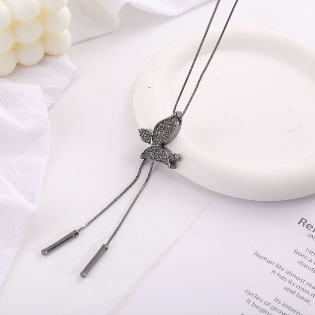 Korean-style, minimalist butterfly tassel necklace, long sweater chain, elegant and versatile jewelry for women, wholesale from the manufacturer