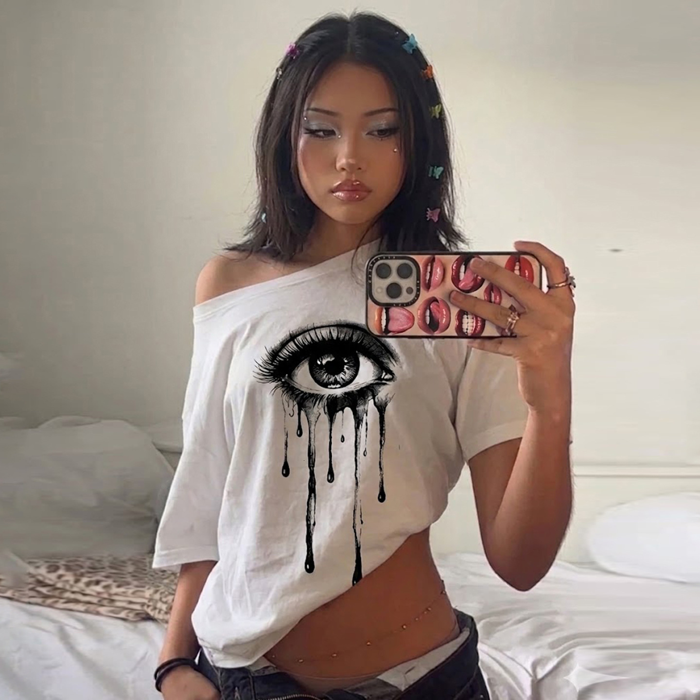 American casual street style, retro trend, oversized print featuring large eyes and eyelashes, asymmetrical shoulder design, short-sleeve T-shirt, f