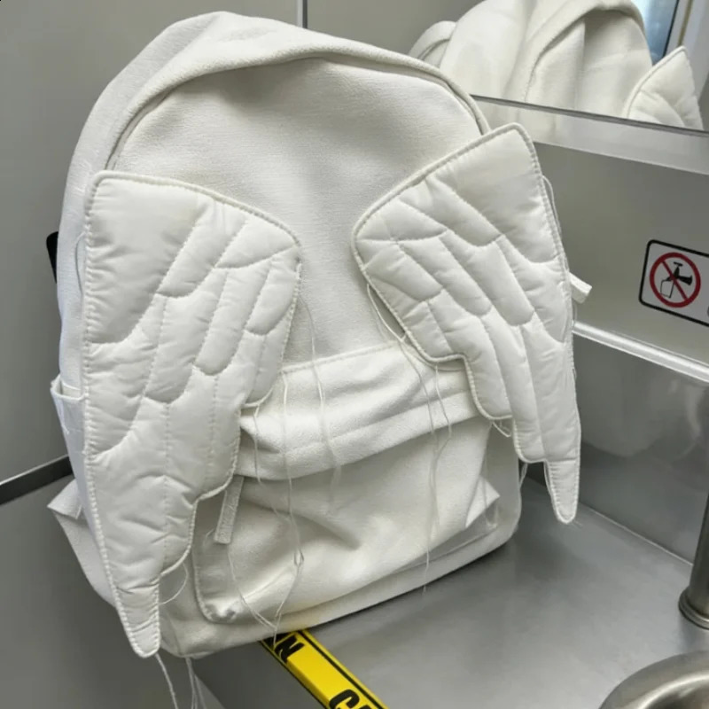 Y2k Style Wing Backpack For Women Japanese Cute Angel Canvas Bag Creative Tassel Solid Color Student Large Capacity Shoulder Bag 260916