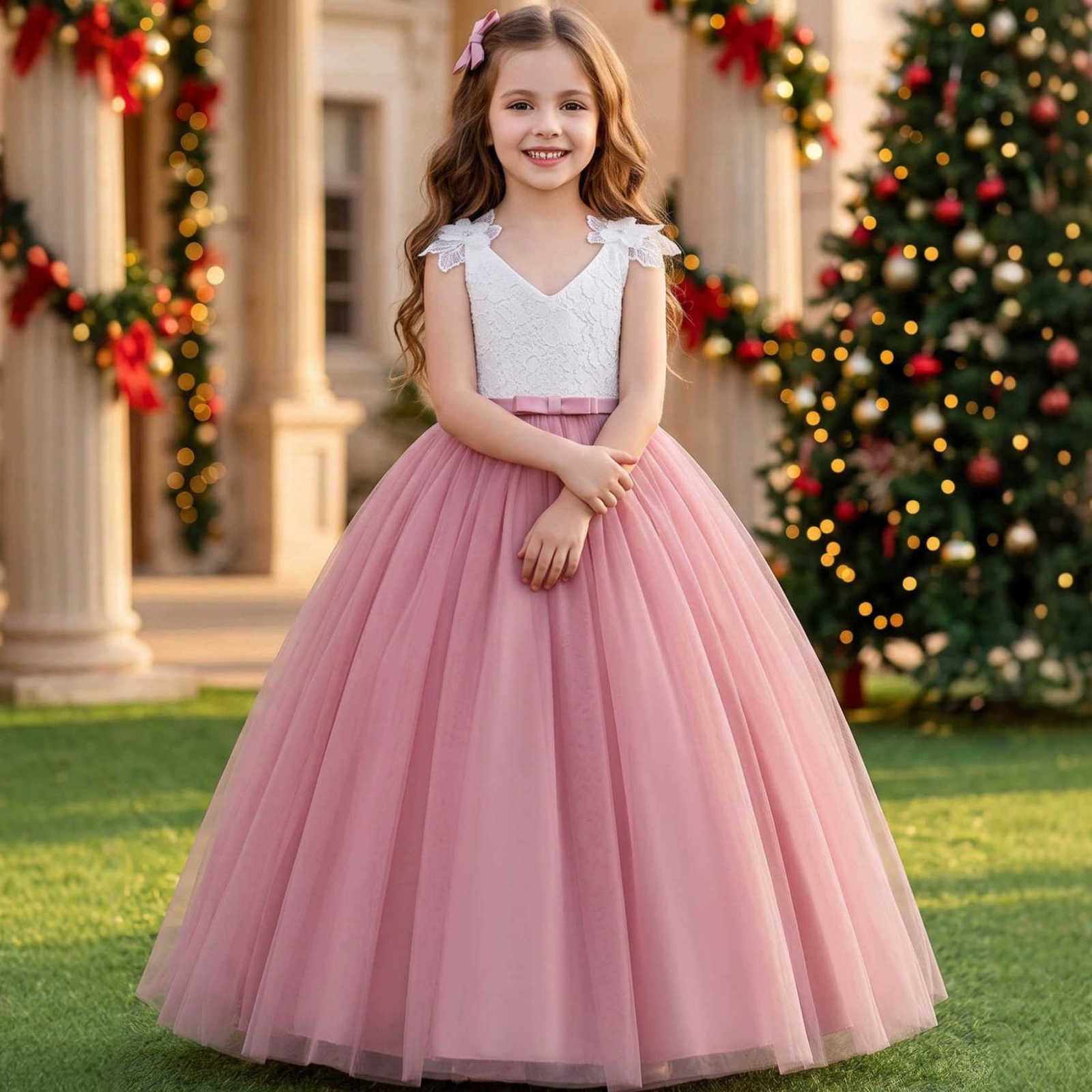 Long floral dress for girls featuring a floral print spaghetti straps and a puffy princessstyle skirt suitable for flower girls weddings piano recit
