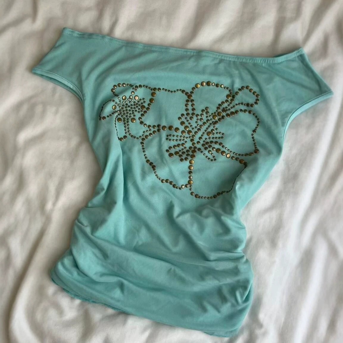 INS-style off-the-shoulder top with rhinestone floral embellishments, fitted silhouette, short sleeves, a Y2K-inspired, trendy, and retro American s