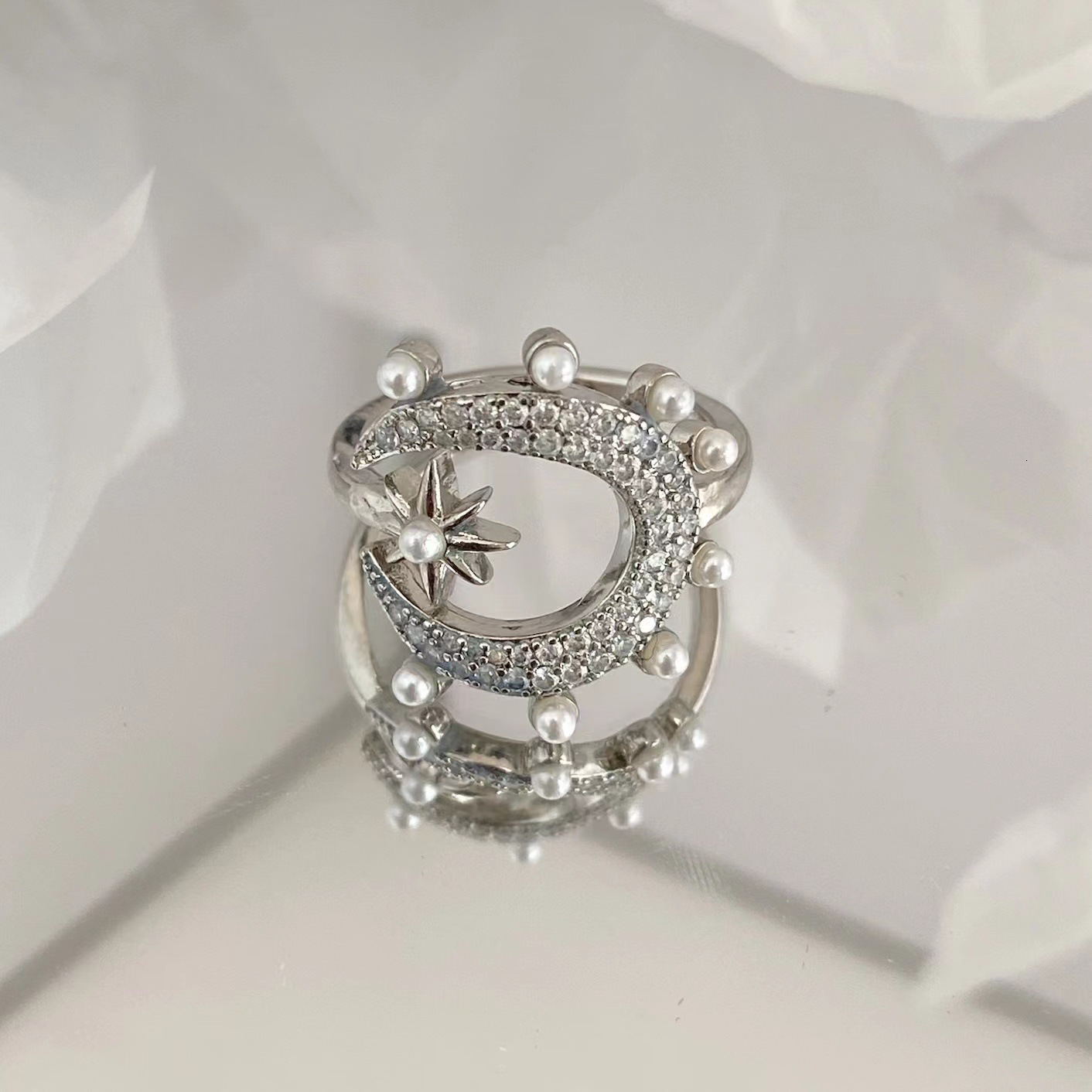 New stylish pearl star moon ring women, a niche, high-end, lightweight luxury piece, versatile chic, suitable for European and American markets