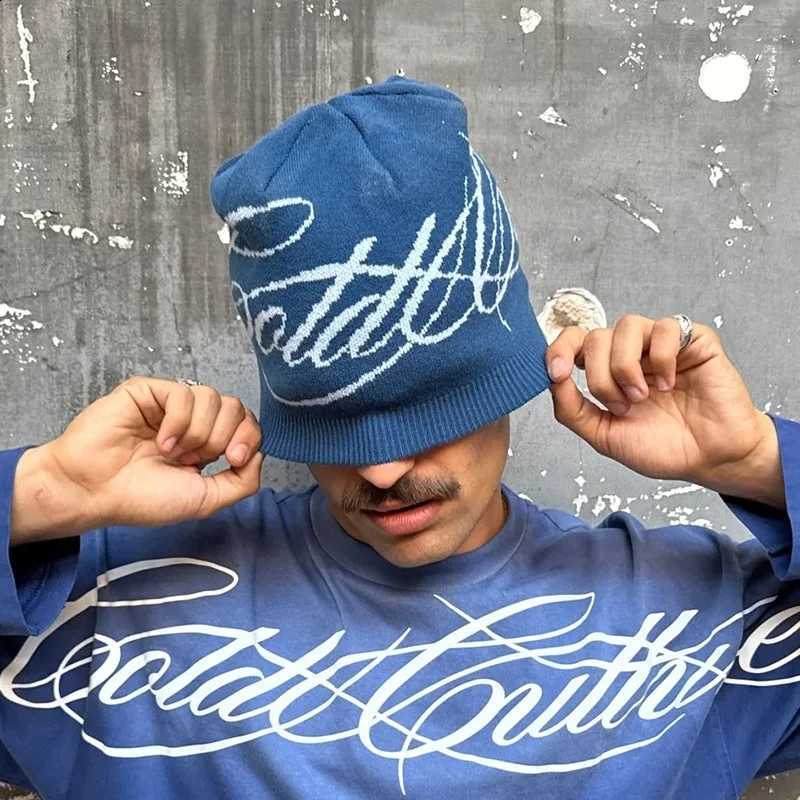 New fashion trend in autumn and winter knitted hat personalized street ins with American hip-hop wind-proof warm cold hat.T260916