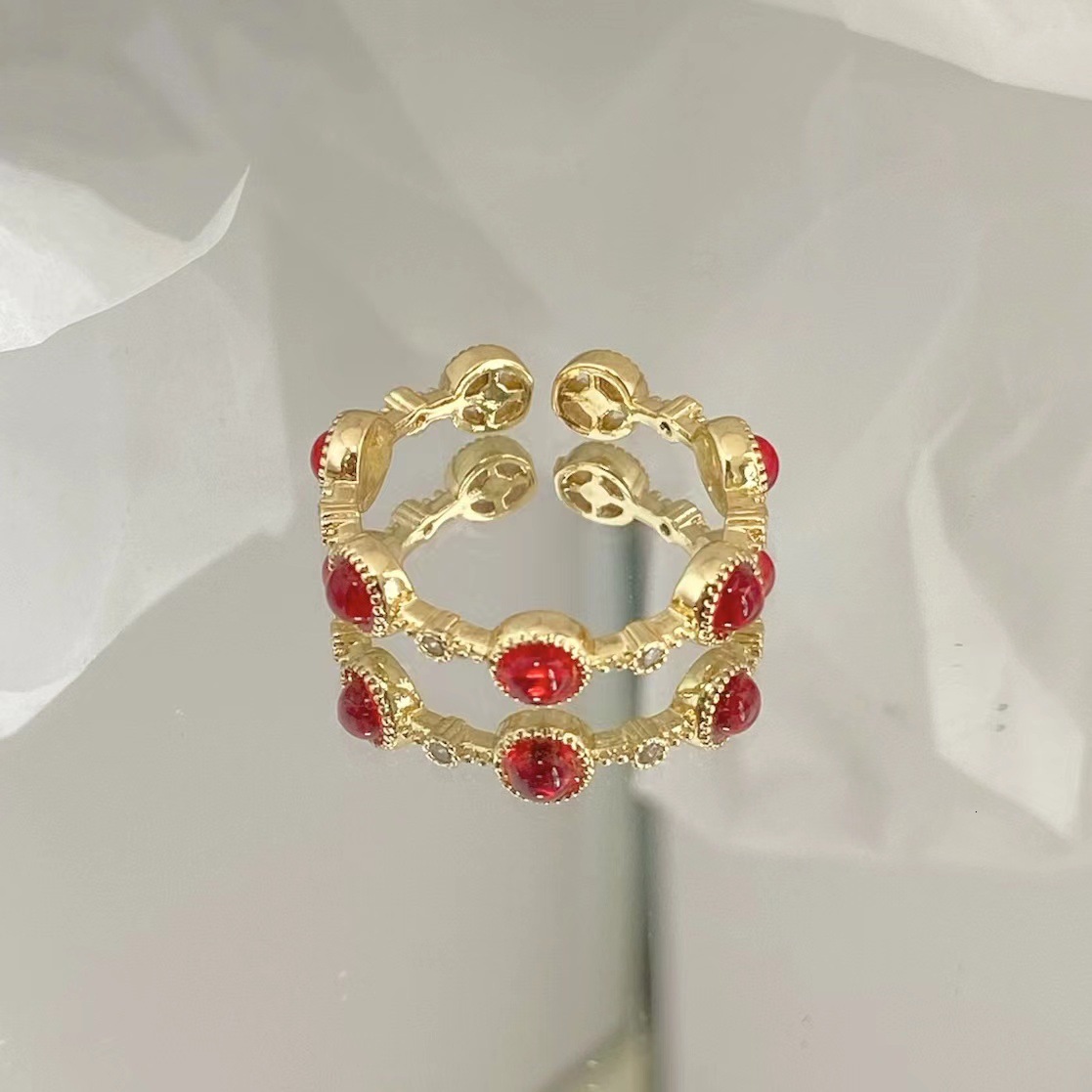New French-style retro round ruby ring, a niche high-end luxury piece with delicate cubic zirconia embellishments, exuding elegance and versatility