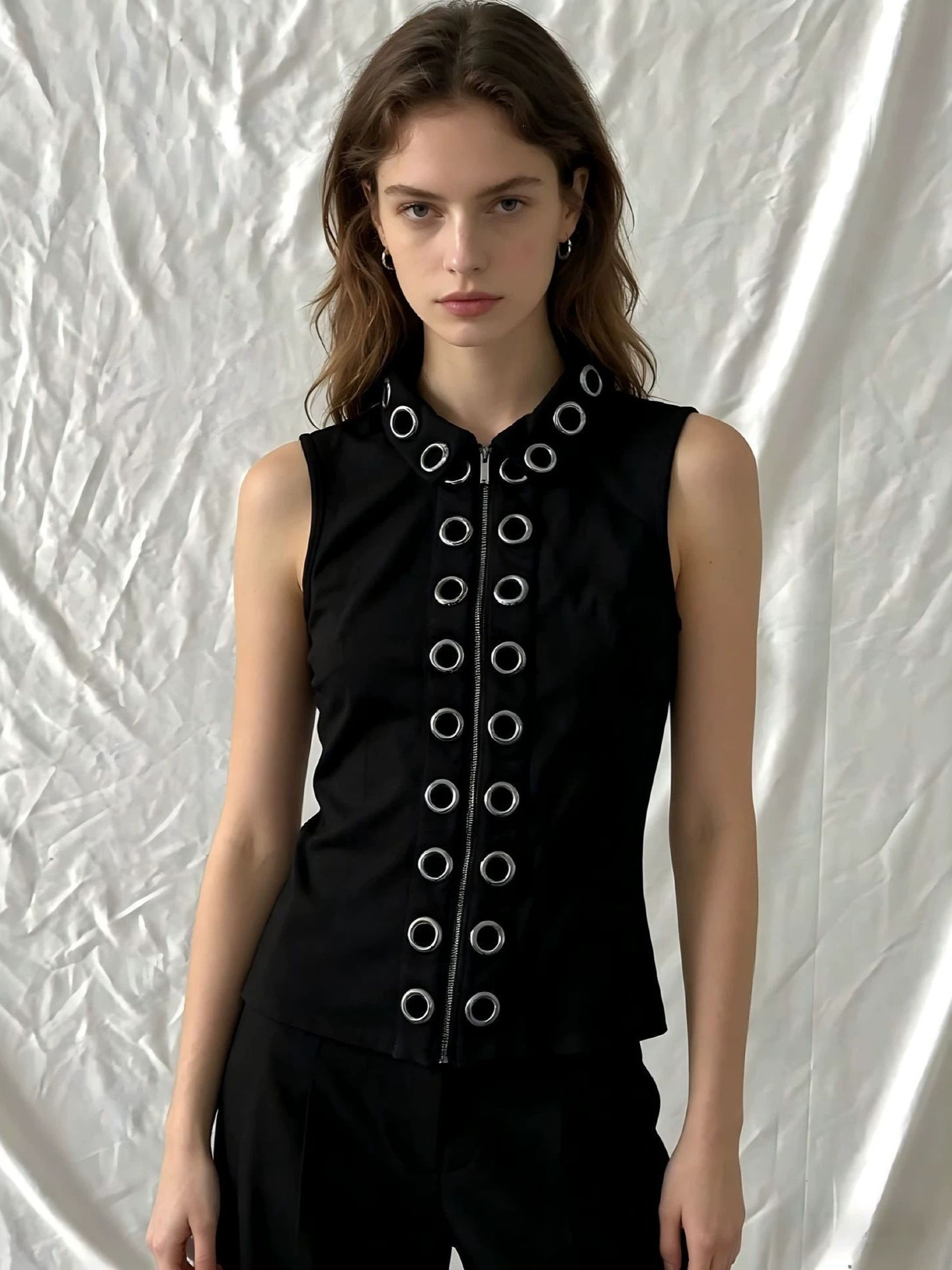 Stand-up collar sleeveless vest for women, featuring metal eyelet detailing zipper, fitted top in a punk, edgy, and gothic subculture style 28