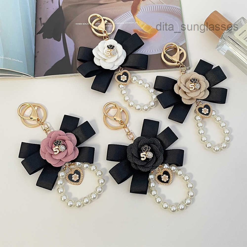 Keychain For Women High End Exquisite Korean Style Camellia Ribbon Pearl Bag Pendant Fashion Small Gift Accessories