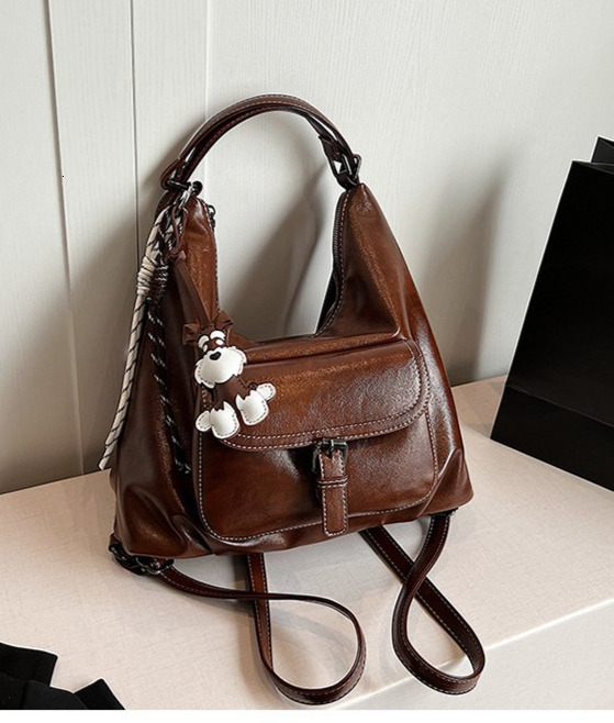 Style Backpack 2026 New Large Capacity Soft Leather Shoulder Commuter Multifunctional Crossbody Women's Bag