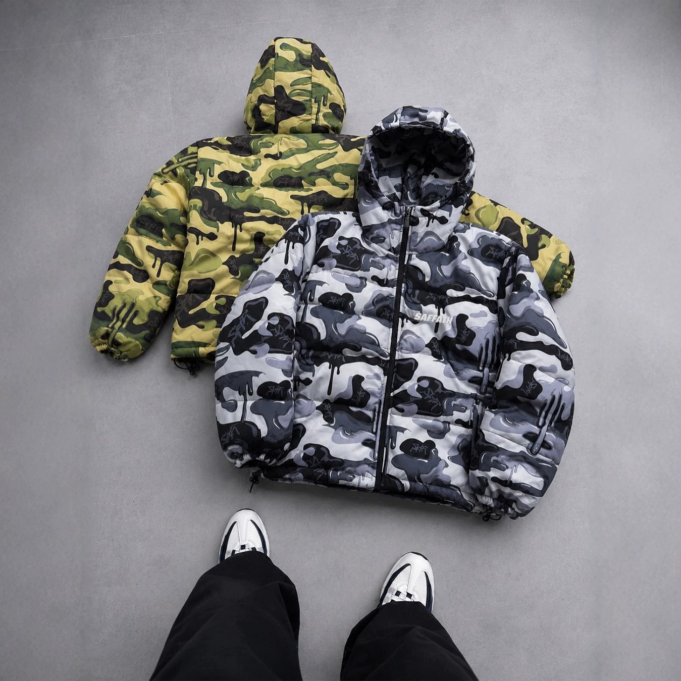 European American cross-border painted camouflage hooded cotton jacket with graffiti all-over print, thickened loose fit, unisex high-street style,