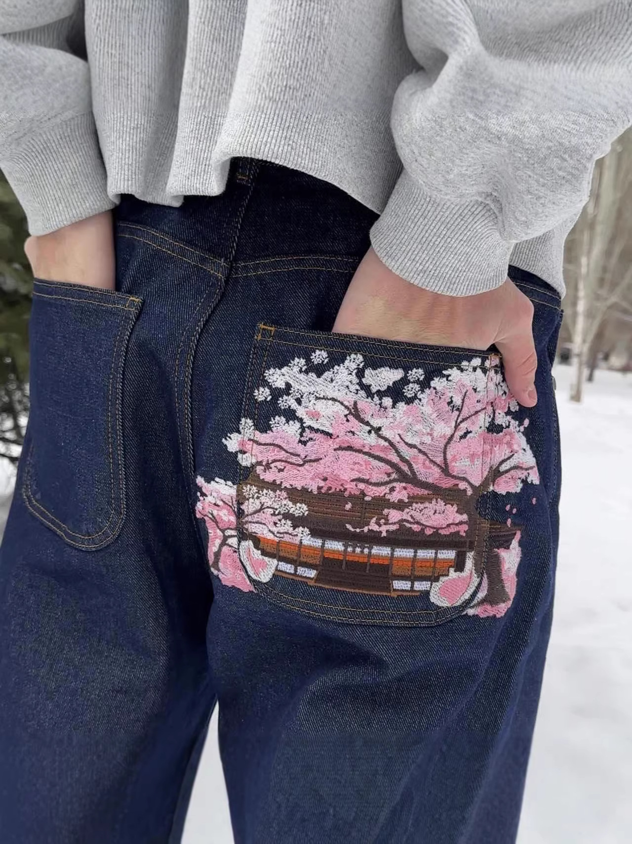 Cross-border export denim pants, unisex, American retro style, featuring cherry blossom embroidery, decorative pockets, and a wide-leg, straight-cut