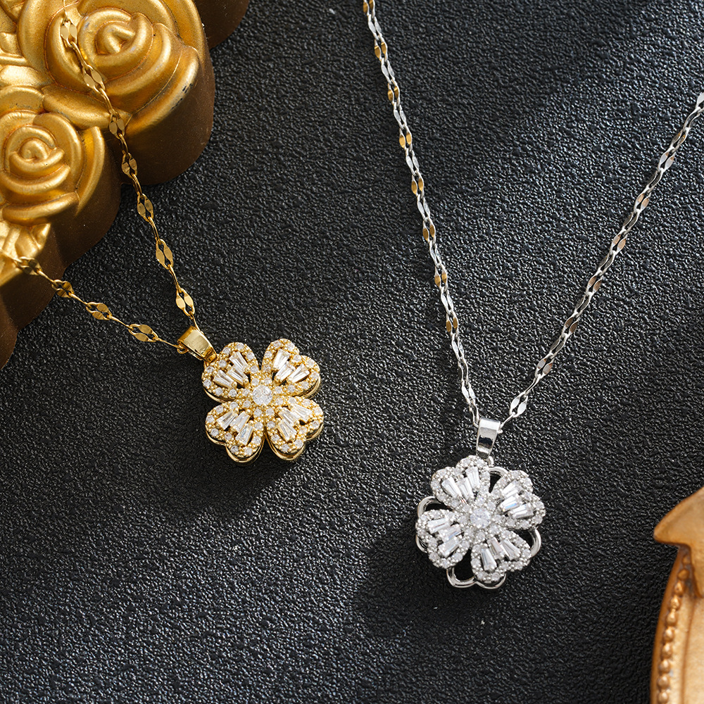 Fashionable elegant hollowed-out rotating pendant, featuring luxurious design with cubic zirconia stones, popular style among influencers, and a fou
