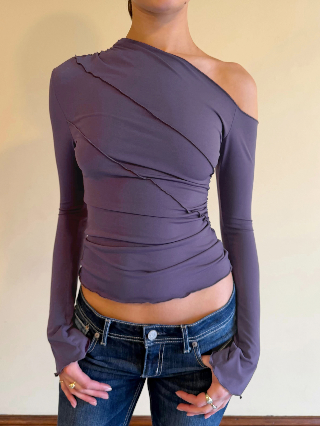 Cross-border irregular design long-sleeve slim-fit T-shirt, European American style, trendy, solid color, with contrasting stitching, and a slanted